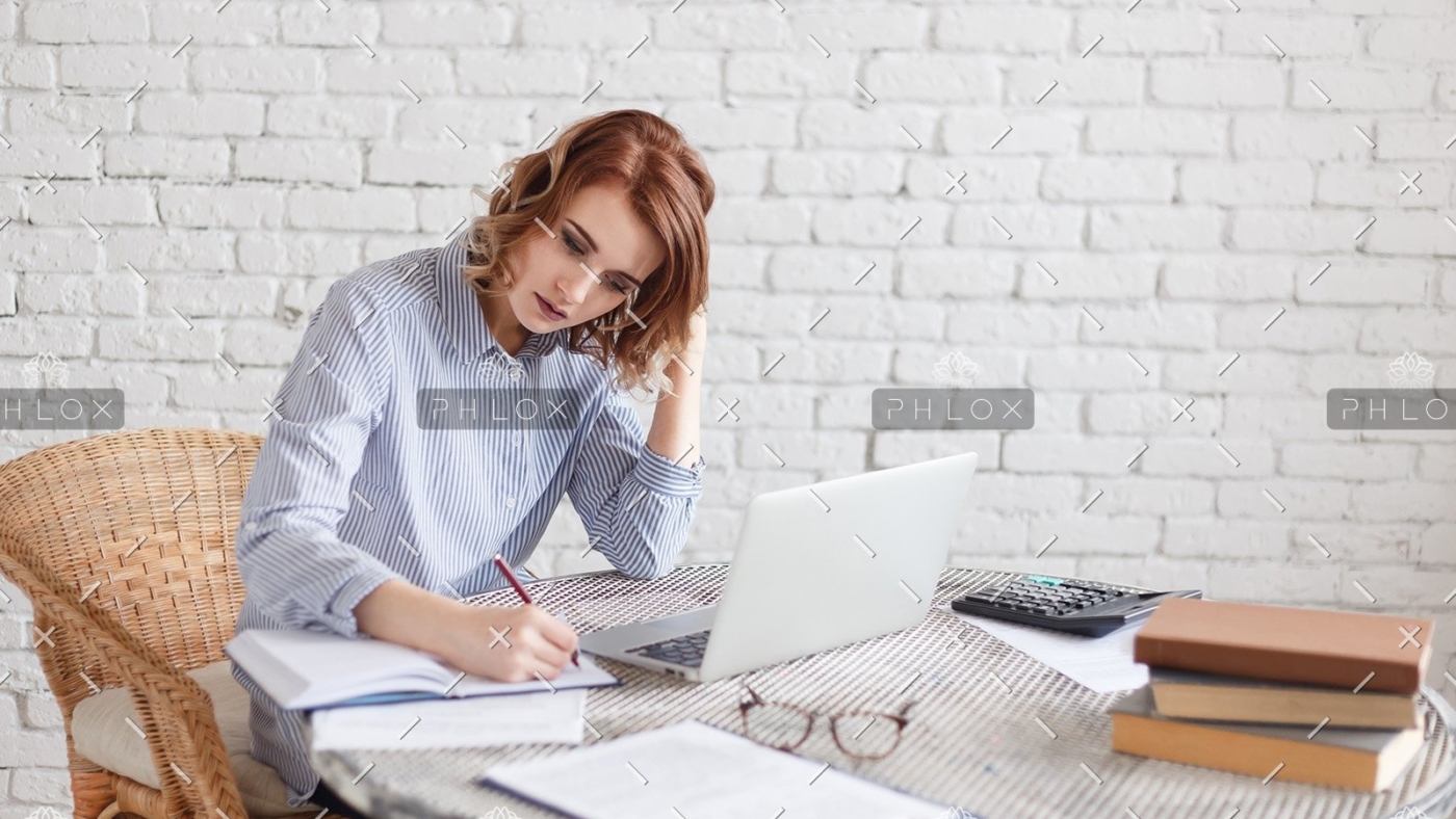 woman-freelancer-female-hands-with-pen-writing-on-P369BAX1